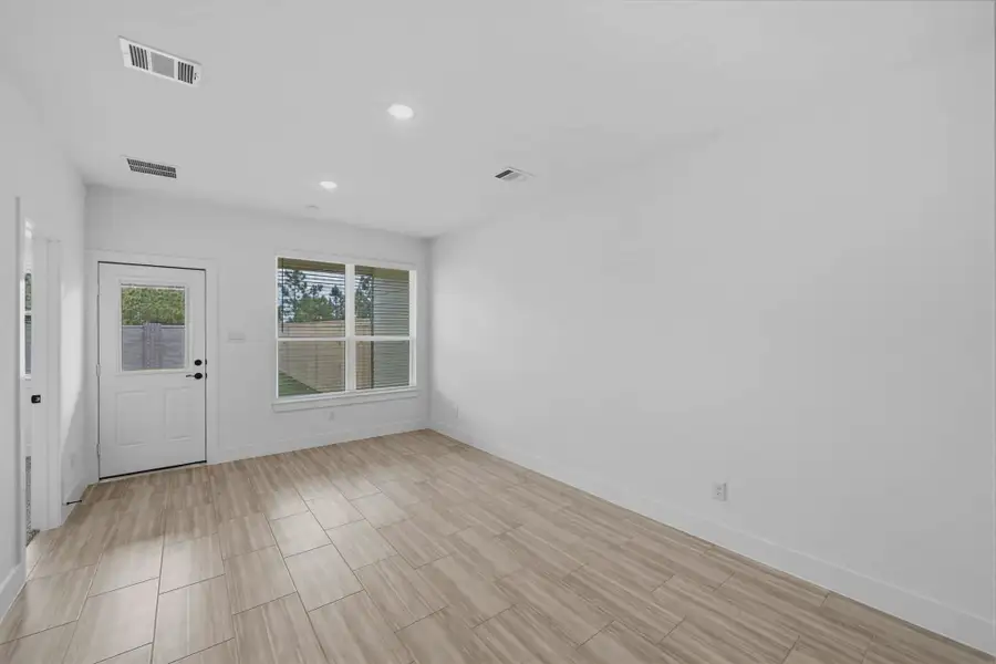 Representative unfurnished interior of a home built from the Margaux by Chesmar Homes in Bridgeland Chateau, Cypress (Image 40).