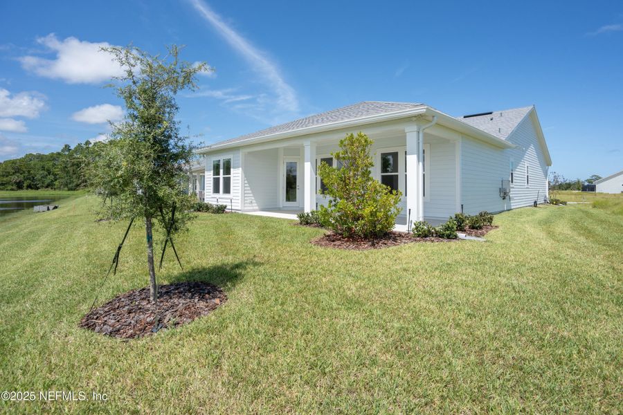 Exterior details and patio area of a home in Madeira, St. Augustine (Image 4).