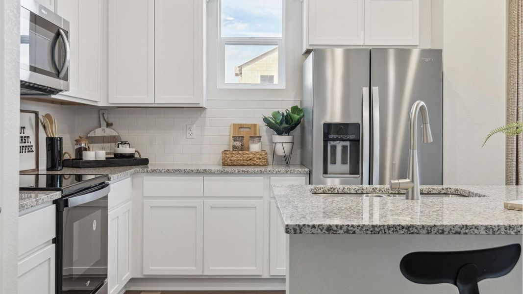 Furnished interior view inside a new home in Settlers Crossing, Commerce City (Image 10).