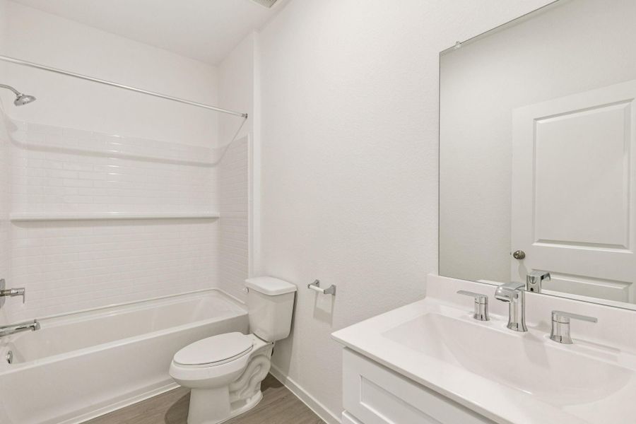 Furnished interior view inside a new home in Mavera, Conroe (Image 12).