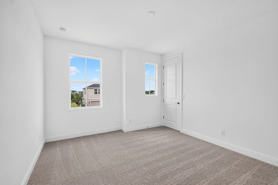 Spacious, unfurnished interior of a new home in The Sanctuary – Royal Collection, Punta Gorda (Image 27).