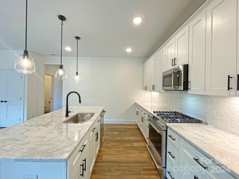 Kitchen with Tile Backsplash