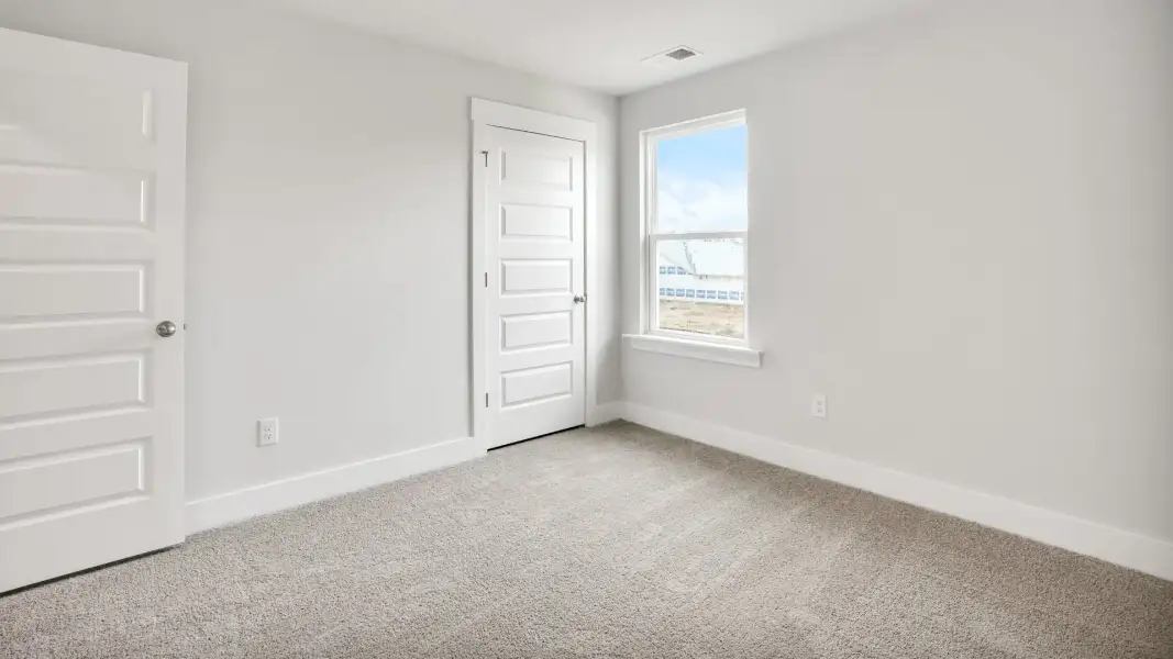 Spacious, unfurnished interior of a new home in Saltgrass Landing, Winnabow (Image 29).