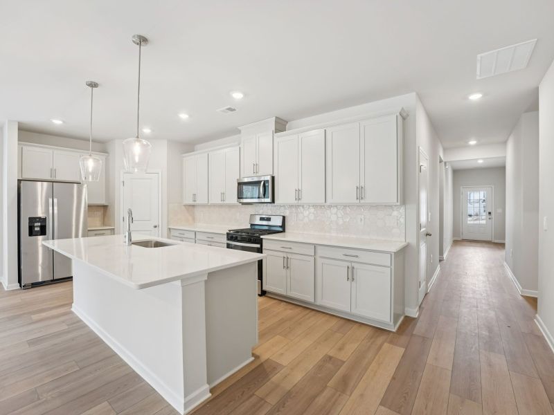 Furnished interior view inside a new home in Northwoods at Mirror Lake, Villa Rica (Image 7).