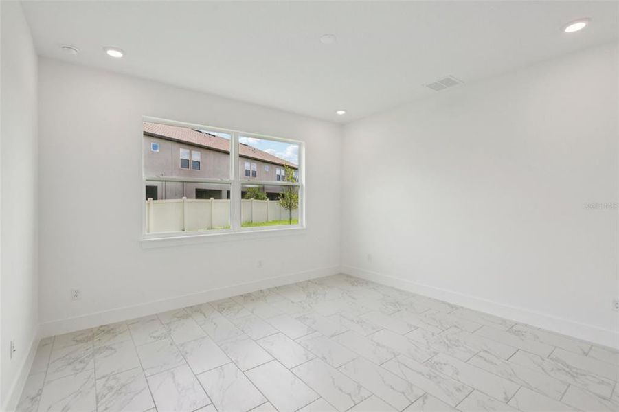 Spacious, unfurnished interior of a new home in Lagoon Residences at Epperson, Wesley Chapel (Image 40).