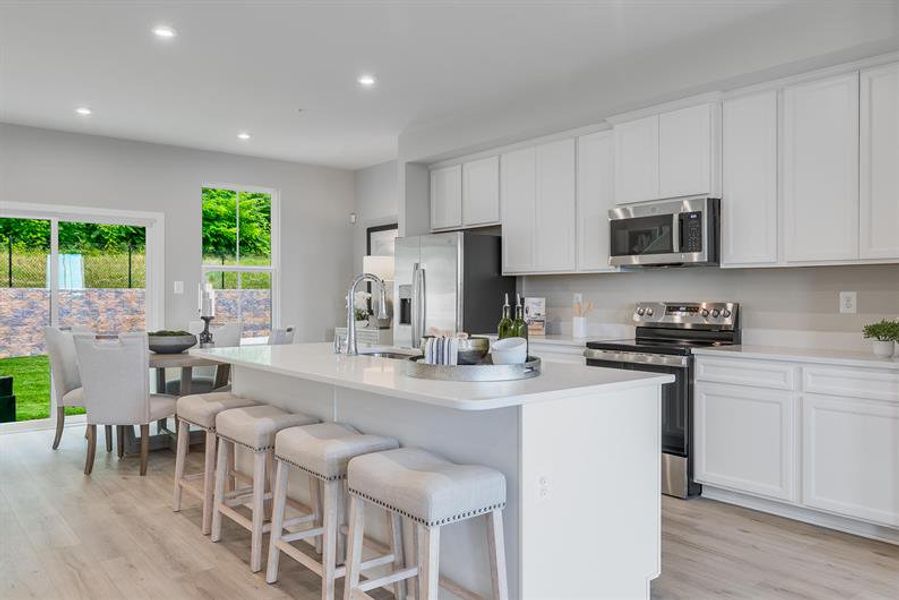 Representative furnished interior of a home built from the Overture by Ryan Homes in Moore Farm Townhomes, Indian Trail (Image 9).