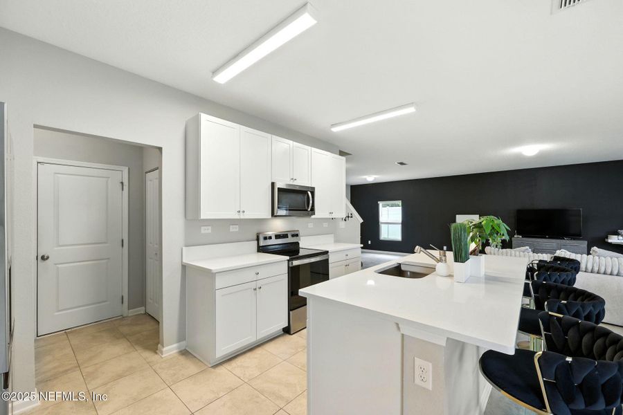 Furnished interior view inside a new home in , Jacksonville (Image 13).