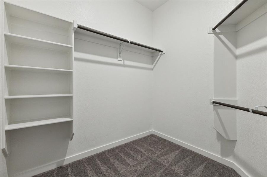 Primary Closet in the Amber home plan by Trophy Signature Homes – REPRESENTATIVE PHOTO