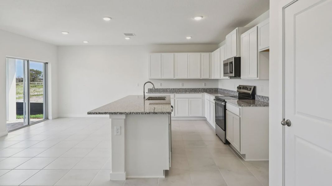 Kitchen of the Baker Floor Plan by DRB Homes in Liberty Trace New Homes in Haines City