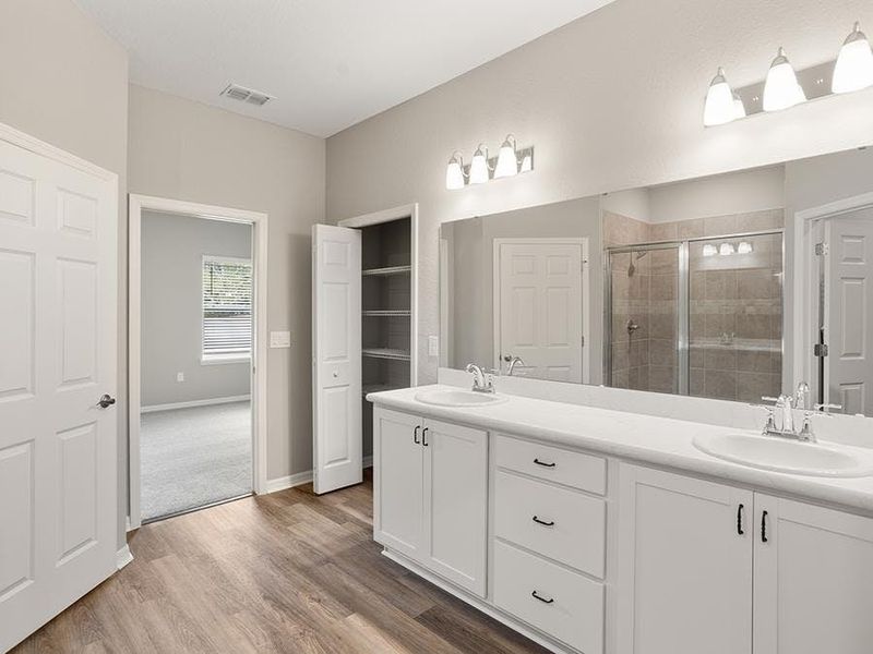Your suite is complete with a walk-in closet and large en-suite bath.