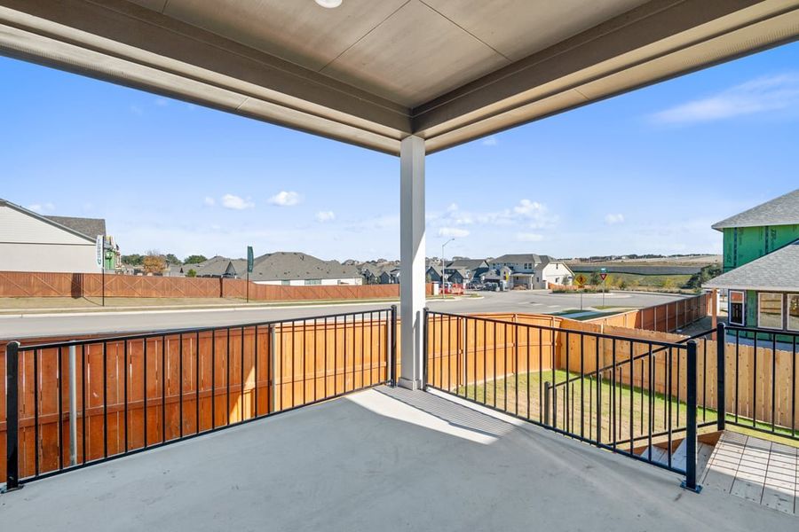 Exterior details and patio area of a home in Park Collection at Lariat, Liberty Hill (Image 4).