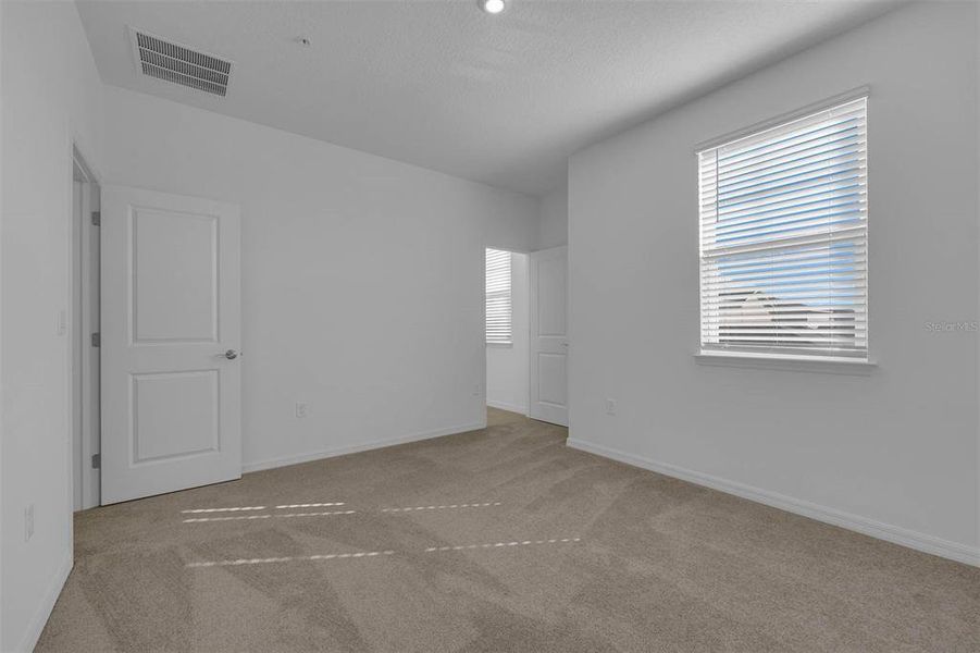 Spacious, unfurnished interior of a new home in Brack Ranch, St. Cloud (Image 34).