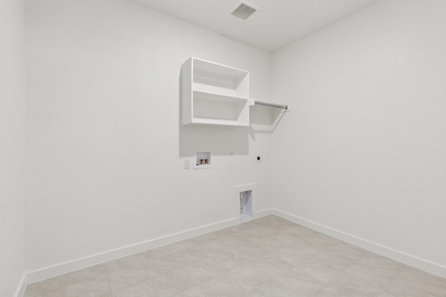 Utility in the Heisman home plan by Trophy Signature Homes – REPRESENTATIVE PHOTO Utility in the Heisman home plan by Trophy Signature Homes – REPRESENTATIVE PHOTO