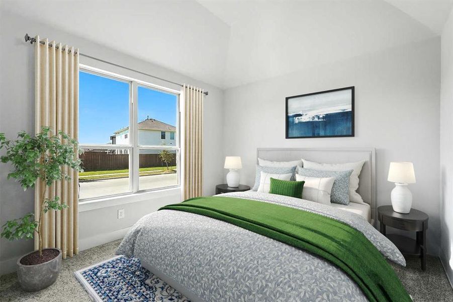 Bedroom with lofted ceiling and speckle patterned floor Bedroom with lofted ceiling and speckle patterned floor