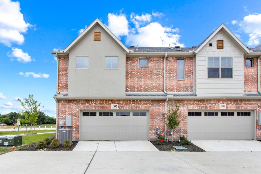 Front exterior of a new home in The Tribute, The Colony, TX, highlighting curb appeal (Image 25).