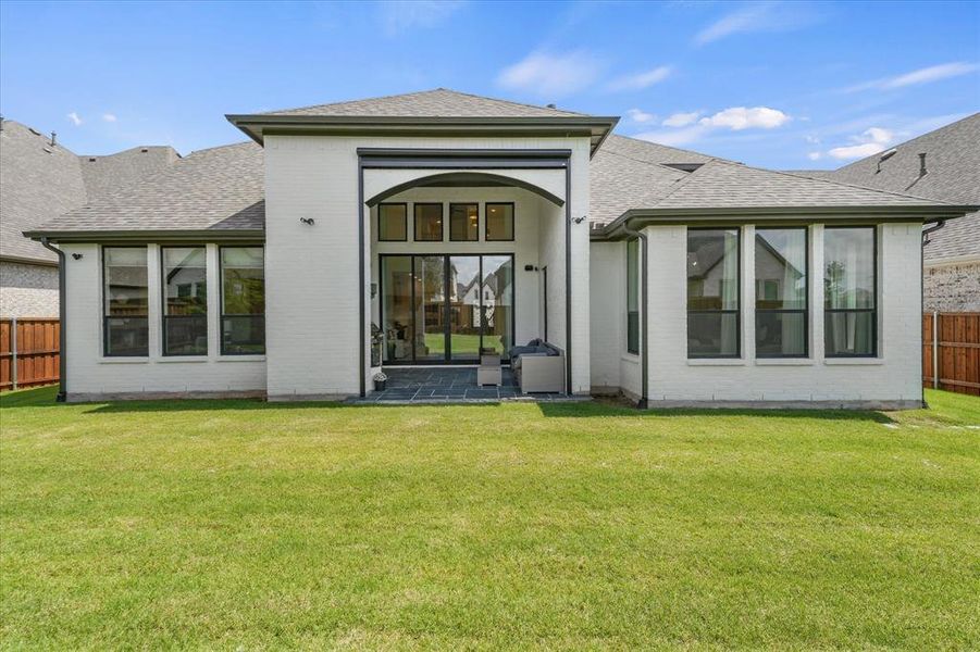 Exterior details and patio area of a home in Star Trail, Prosper (Image 24).