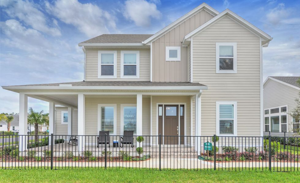 Front exterior of a new home in Seven Pines, Jacksonville, FL, highlighting curb appeal (Image 22).