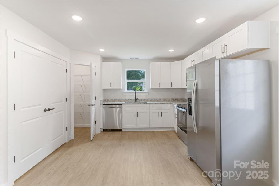Furnished interior view inside a new home in , Hickory (Image 2).