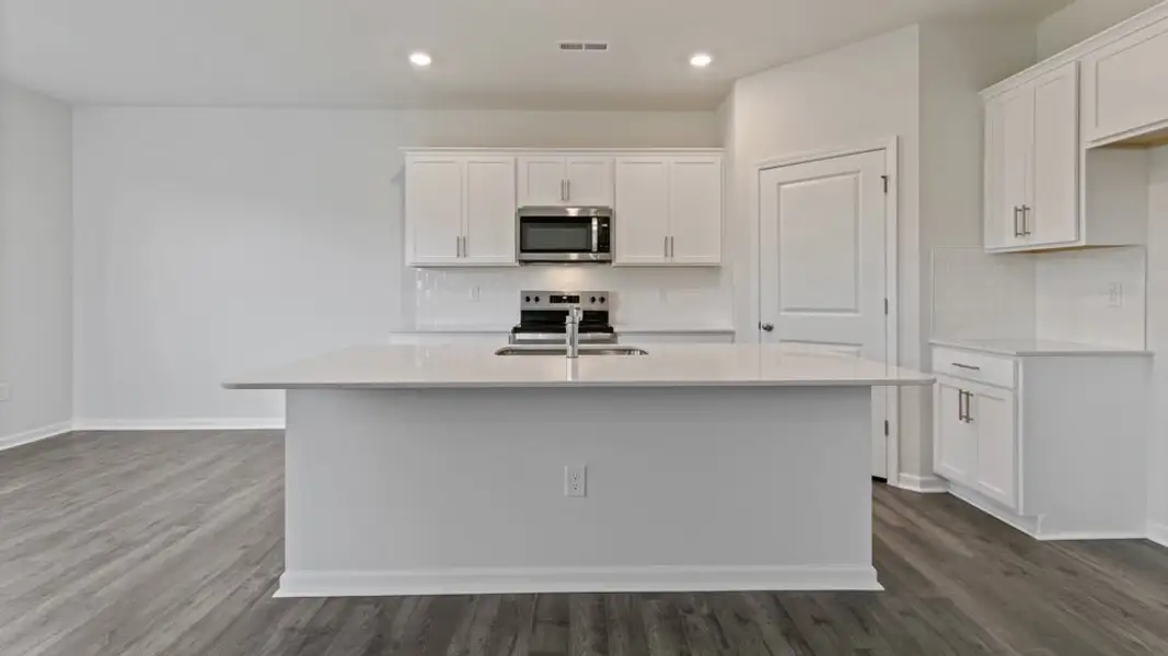 Furnished interior view inside a new home in The Grove at Matthews Landing, Fuquay Varina (Image 3).