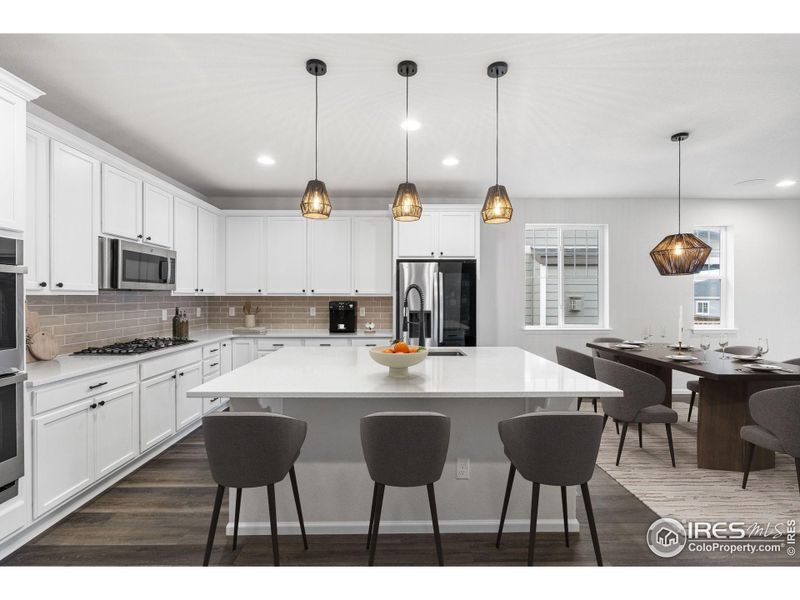 This photo has been virtually staged to provide visual ideas for how furniture can be arranged in this area of the home.