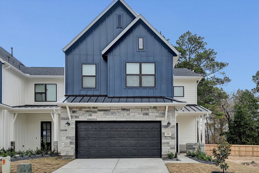 Front exterior of a new home in Summer Place 35', Montgomery, TX, highlighting curb appeal (Image 2). Front exterior of a new home in Summer Place 35', Montgomery, TX, highlighting curb appeal (Image 2).