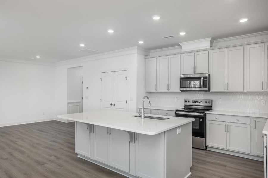 Furnished interior view inside a new home in Daniel Farms, Benson (Image 8).