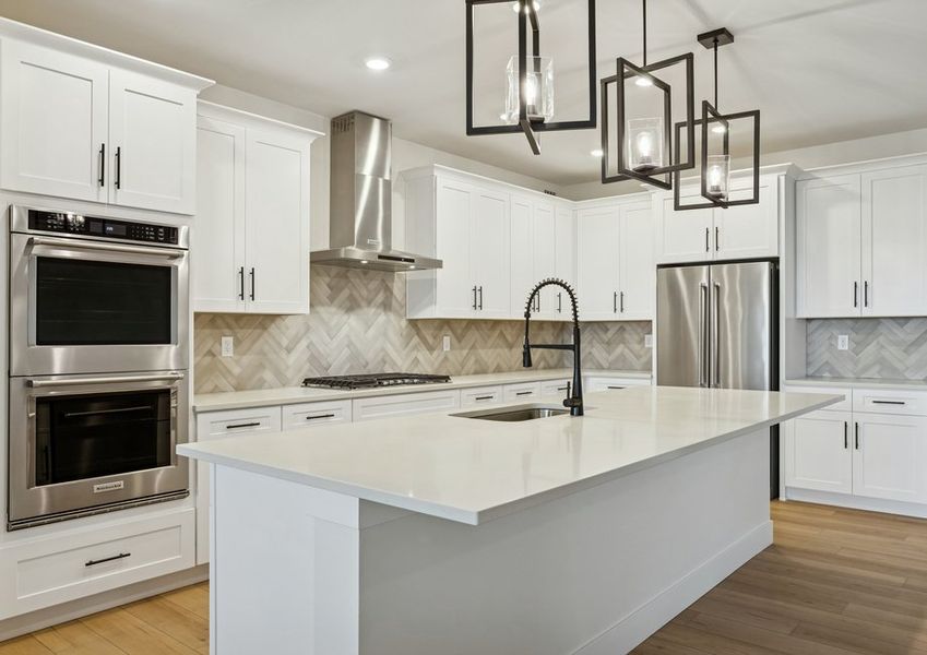 The kitchen has gorgeous quartz countertops.