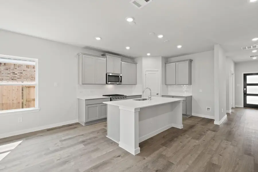 Furnished interior view inside a new home in Sunterra, Katy (Image 8). Furnished interior view inside a new home in Sunterra, Katy (Image 8).