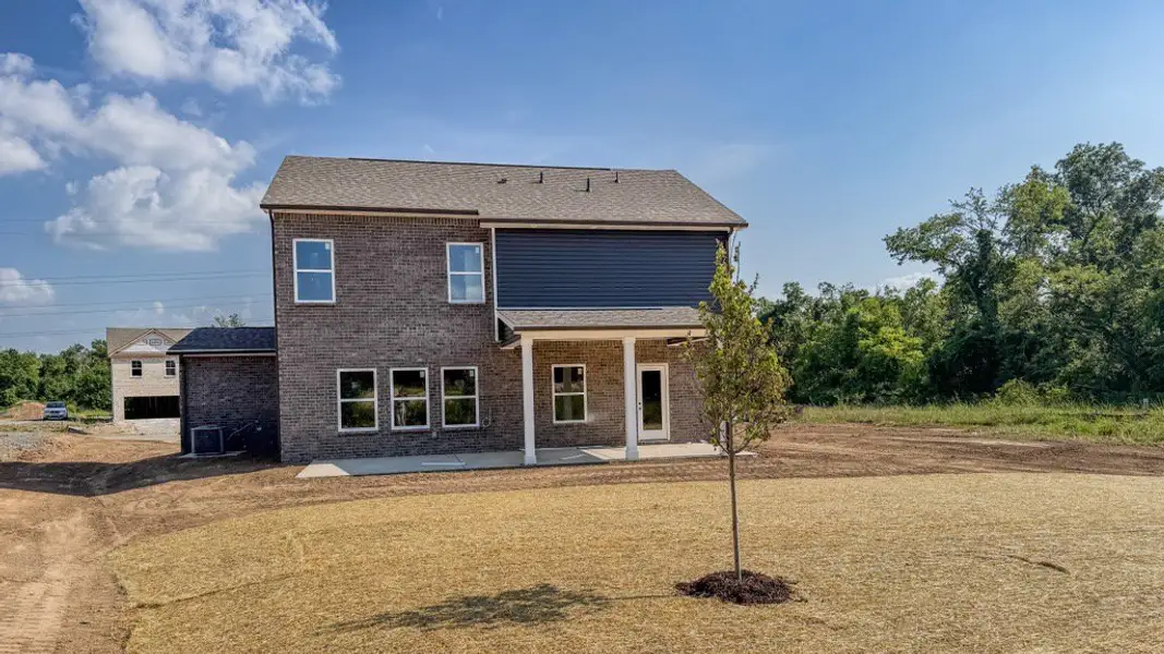 *Photo of actual home, July 2026. Extended, covered rear patio! *Photo of actual home, July 2026. Extended, covered rear patio!