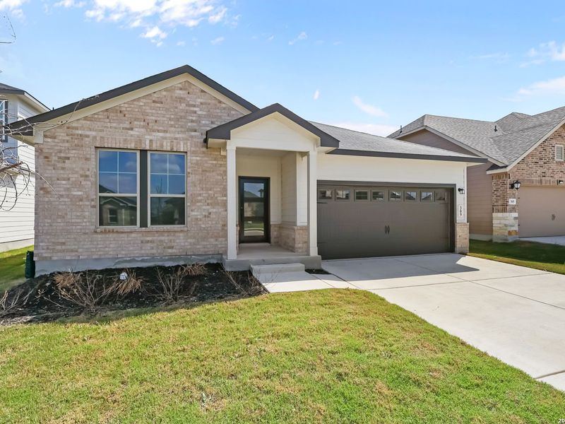 Front exterior of a new home in Hannah Heights, Seguin, TX, highlighting curb appeal (Image 24).