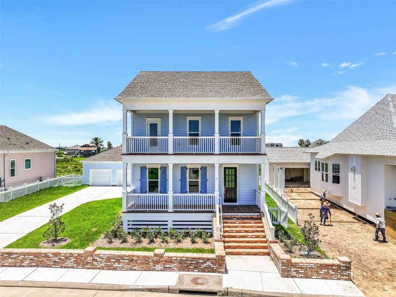 Front exterior of a new home in , Galveston, TX, highlighting curb appeal (Image 1). Front exterior of a new home in , Galveston, TX, highlighting curb appeal (Image 1).
