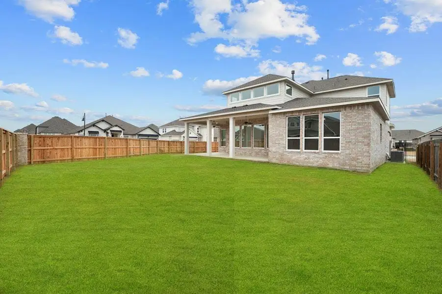 Exterior details and patio area of a home in Santa Rita Ranch, Liberty Hill (Image 3).