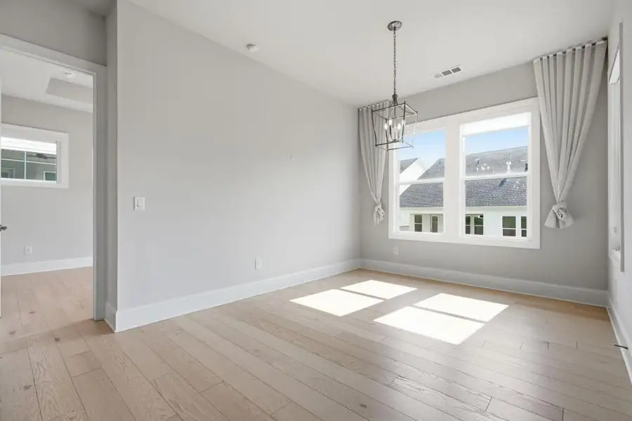 Spacious, unfurnished interior of a new home in , Woodstock (Image 20).