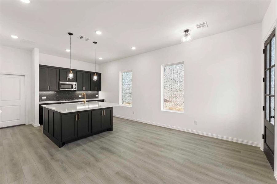 Furnished interior view inside a new home in Collin Creek, Plano (Image 10).