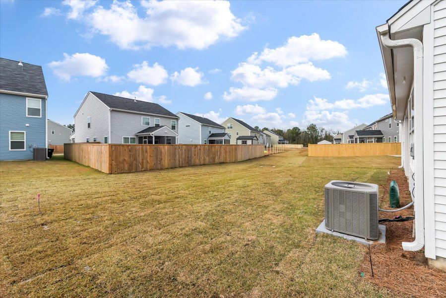 Exterior details and patio area of a home in Oakley Pointe, Moncks Corner (Image 21).