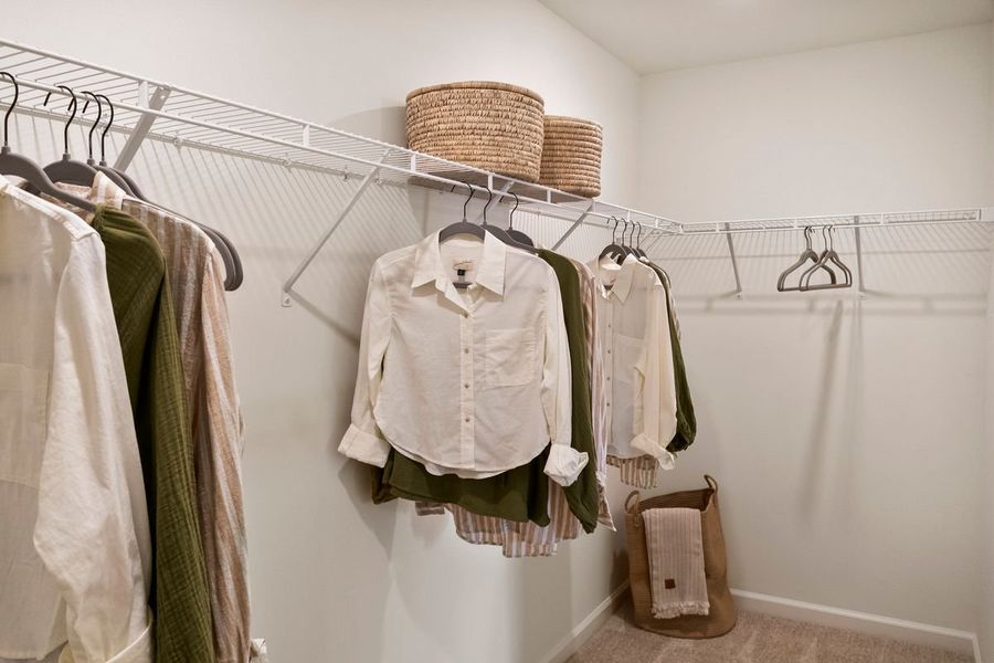 Spacious walk-in closet at primary bedroom