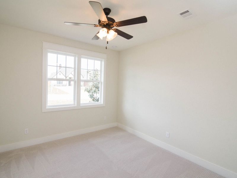 Representative unfurnished interior of a home built from the The Ellen by Reece Homes in Pebble Creek, College Station (Image 22).