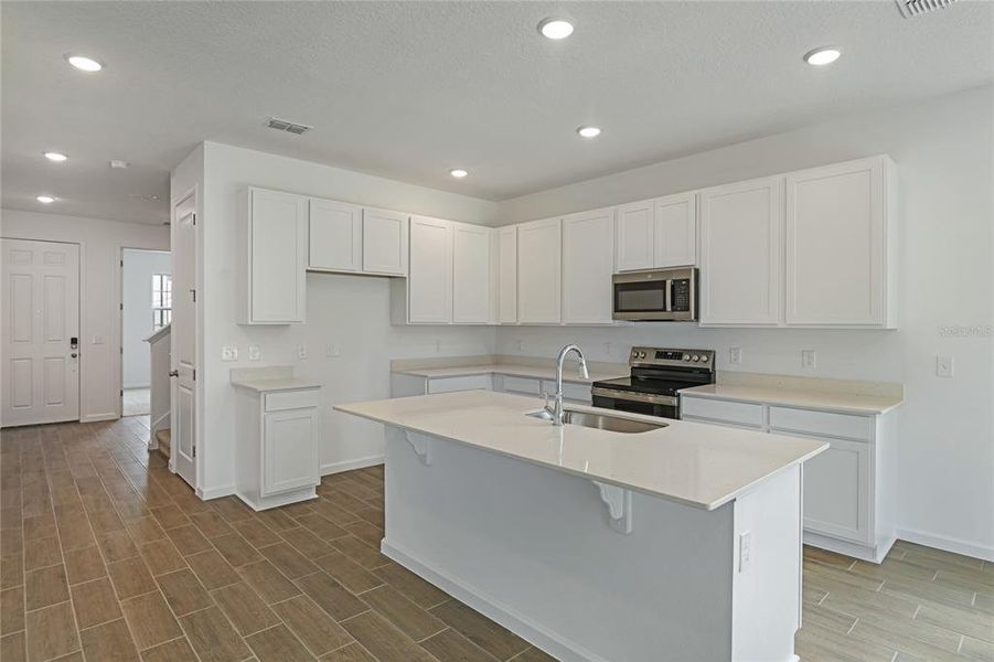 Furnished interior view inside a new home in Seasons at Aurora Oaks, Ocala (Image 8).