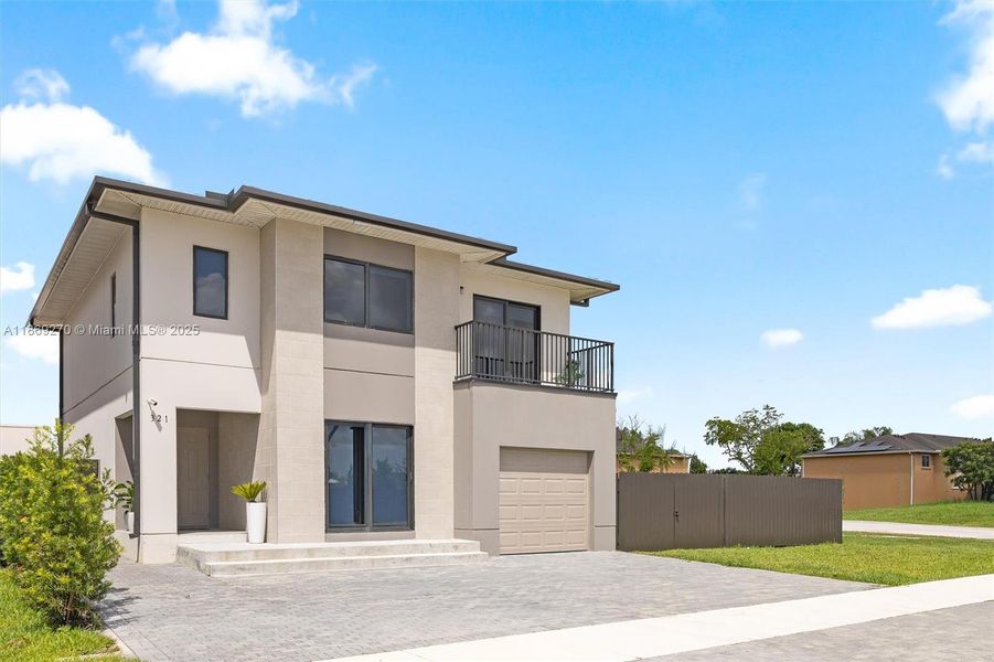 Front exterior of a new home in , Florida City, FL, highlighting curb appeal (Image 24).