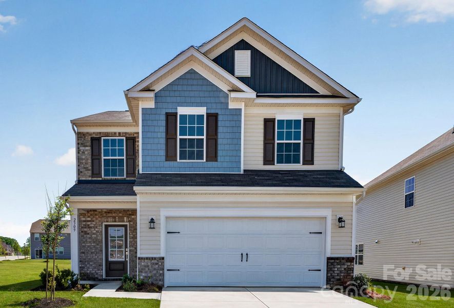 Front exterior of a new home in Shannon Woods, Maiden, NC, highlighting curb appeal (Image 2).