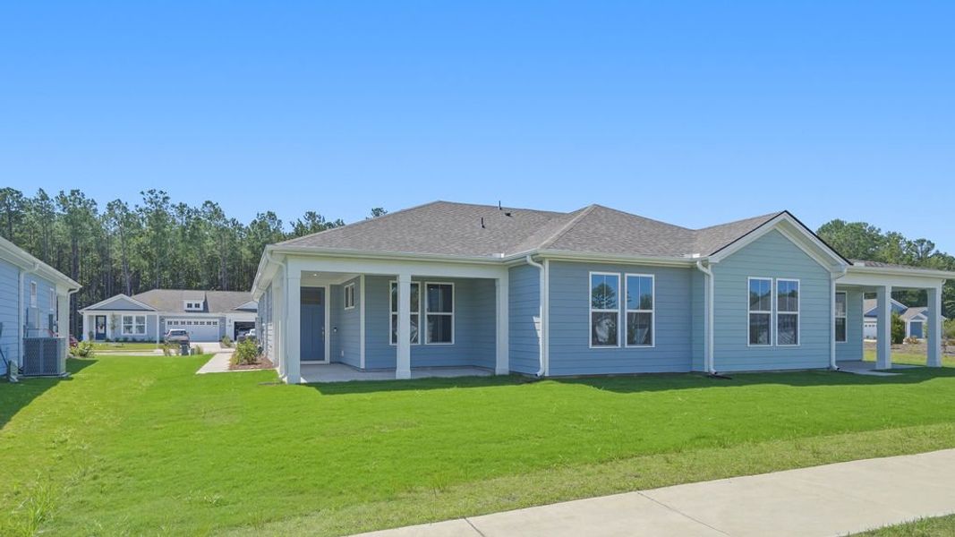 Exterior details and patio area of a home in Sun City Hilton Head, Bluffton (Image 25).