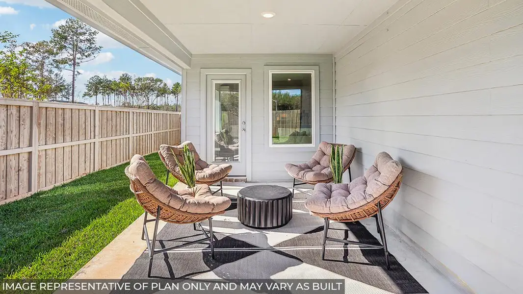 Exterior details and patio area of a home in Porters Mill, New Caney (Image 2).