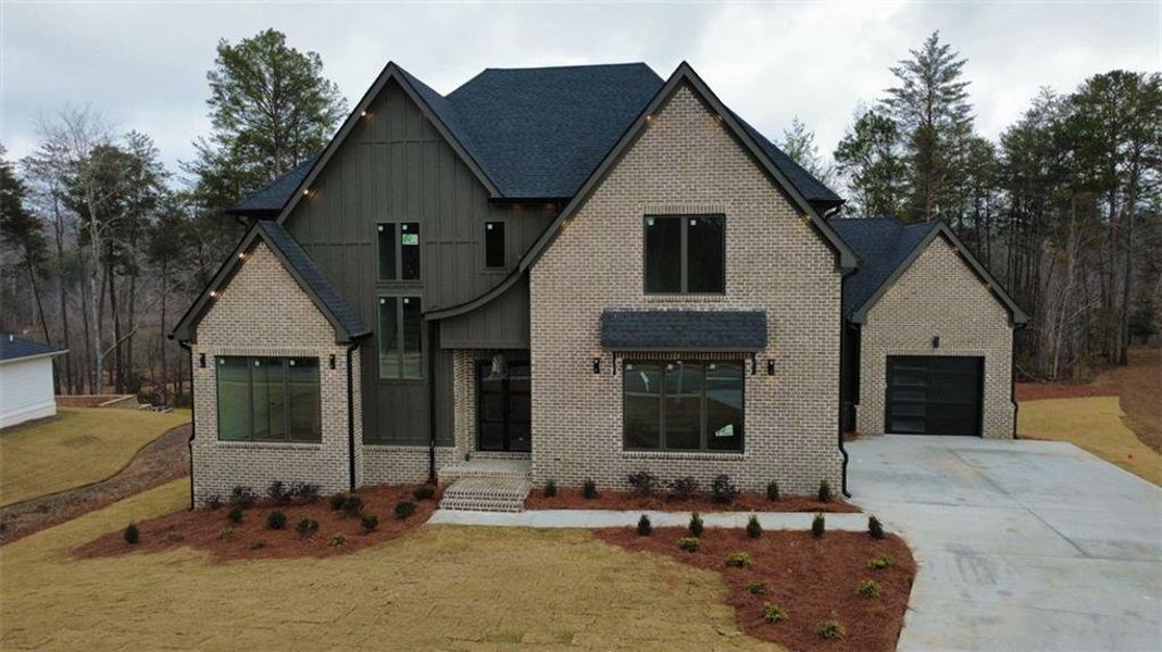 Front exterior of a new home in , Gainesville, GA, highlighting curb appeal (Image 2). Front exterior of a new home in , Gainesville, GA, highlighting curb appeal (Image 2).