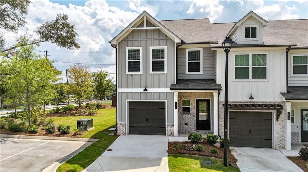 Front exterior of a new home in , Austell, GA, highlighting curb appeal (Image 1). Front exterior of a new home in , Austell, GA, highlighting curb appeal (Image 1).