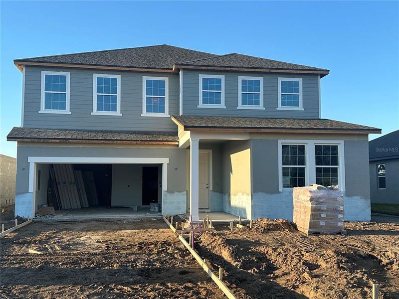In-progress construction of a new home in Oakfield Trails Traditional, Parrish, FL (Image 13).