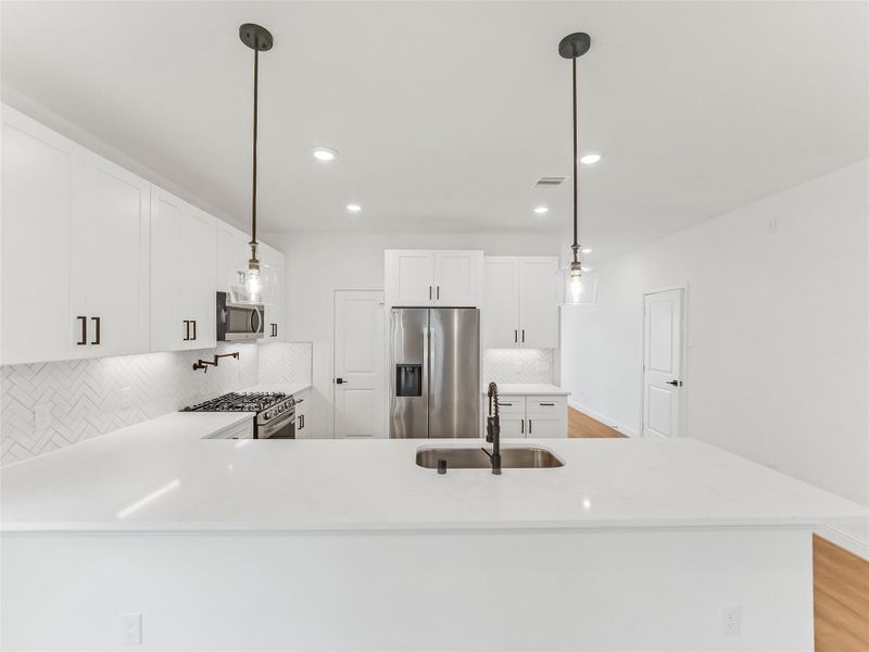 Furnished interior view inside a new home in Hill & Dale Ranch, Splendora (Image 5).
