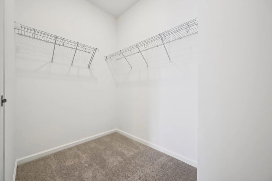 Primary Walk-In featuring the AW Collection® Harmony - Organized luxury with Harmony appeal. Primary Walk-In featuring the AW Collection® Harmony - Organized luxury with Harmony appeal.