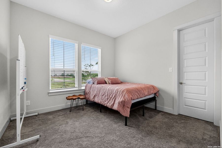 Furnished interior view inside a new home in Pradera Ridge, Floresville (Image 31).