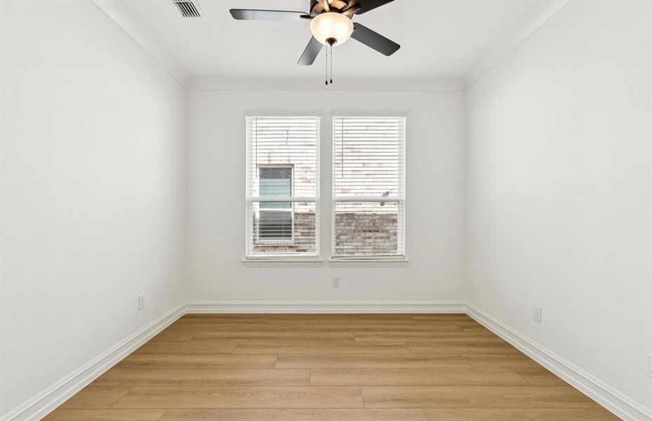 Formal dining room with large windows Formal dining room with large windows