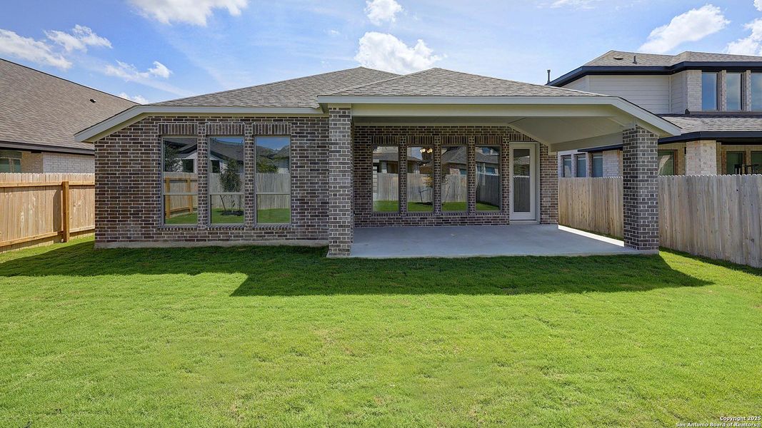 Exterior details and patio area of a home in Kallison Ranch 50', San Antonio (Image 4).